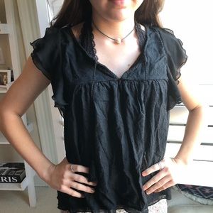 Black ruffle shirt
